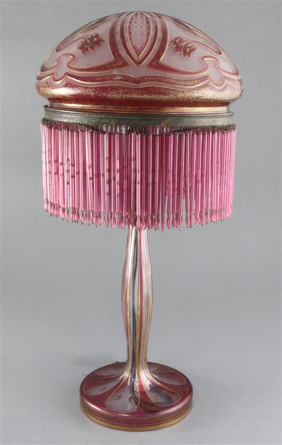 An unusual Bohemian Art Nouveau ruby overlaid clear glass lamp base and shade, c.1905, height 58.5cm